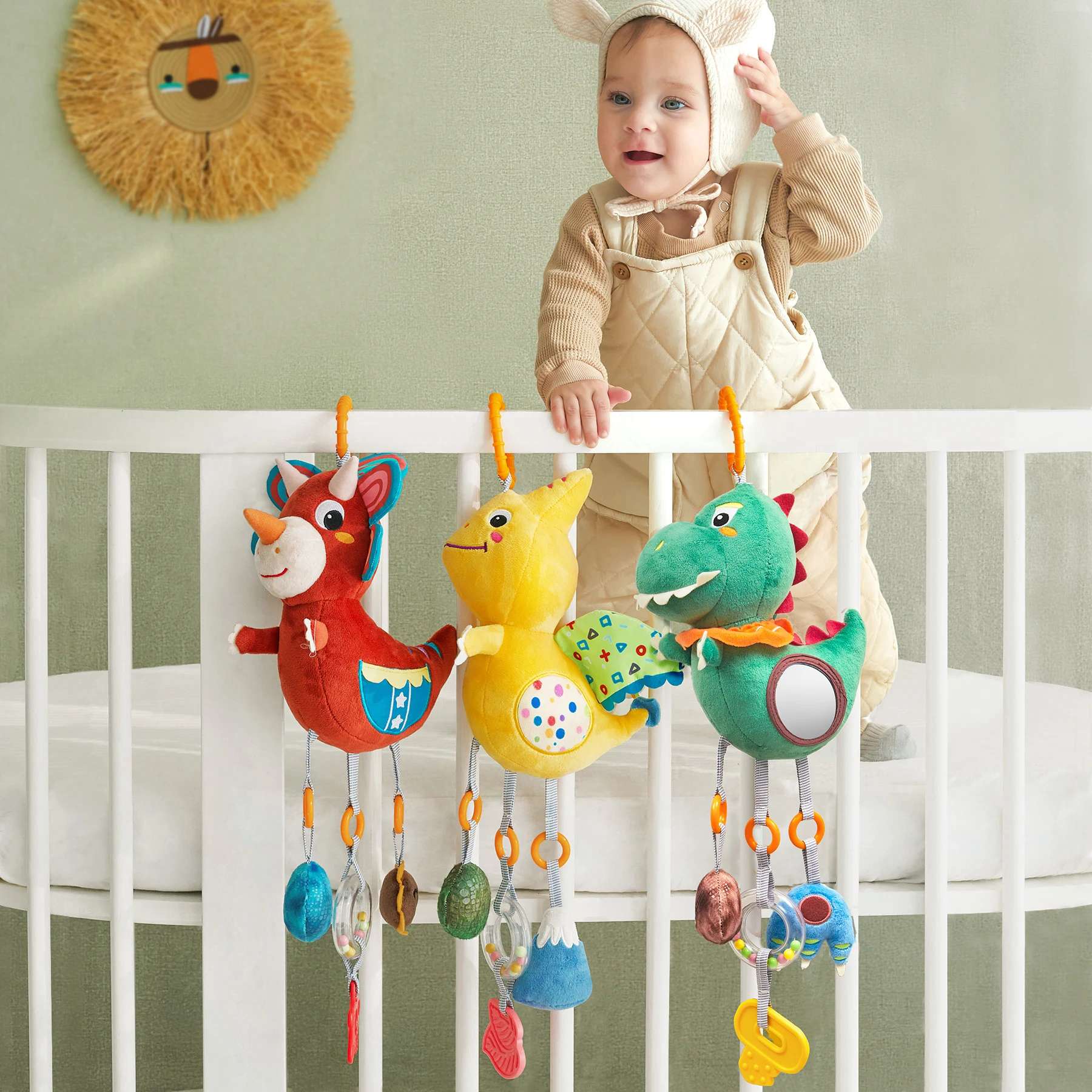 Car seat stroller mobile featuring hanging dinosaur rattle