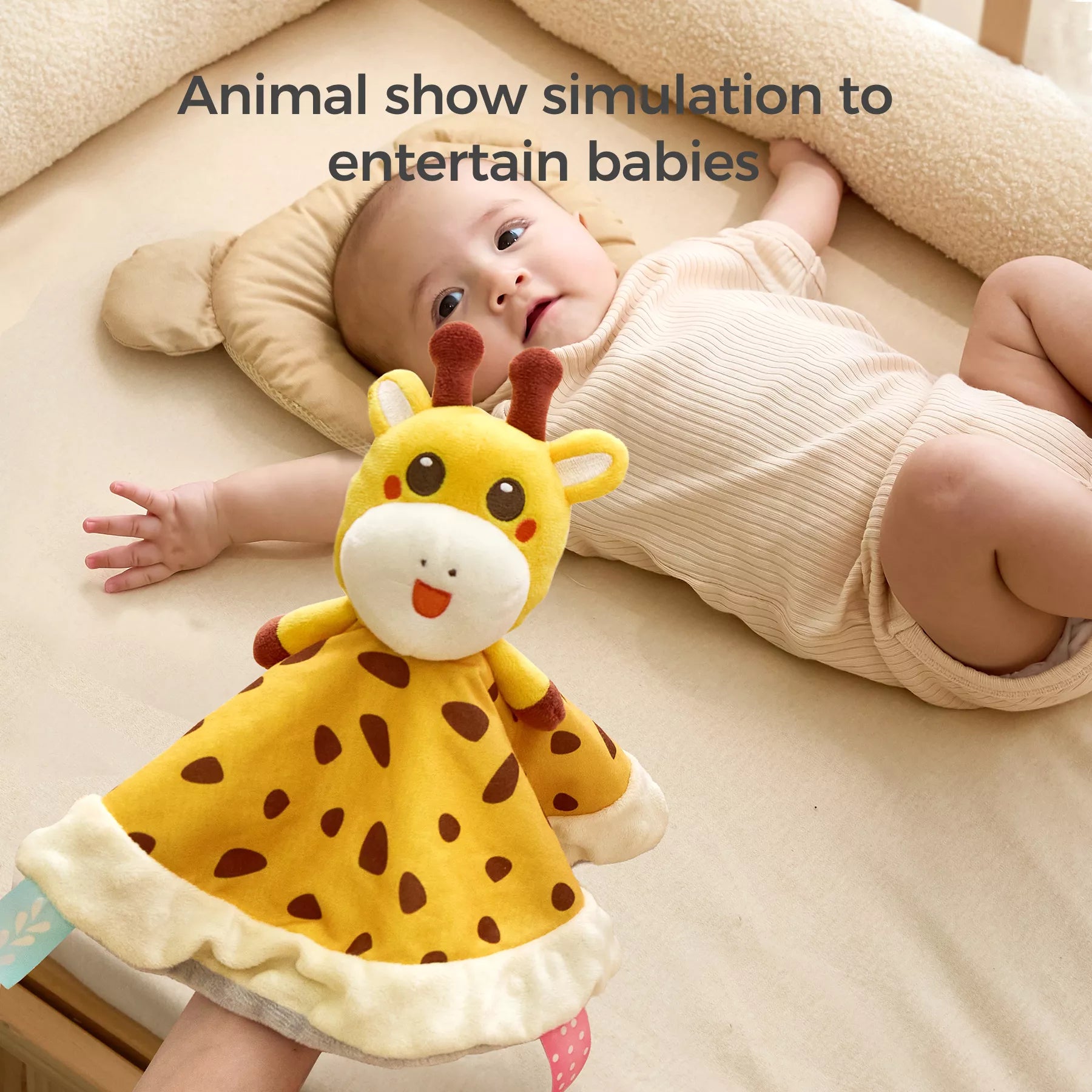 A baby lying on a bed, reaching out while someone holds a cute giraffe baby security blanket in the foreground. The text above reads, "Animal show simulation to entertain babies."