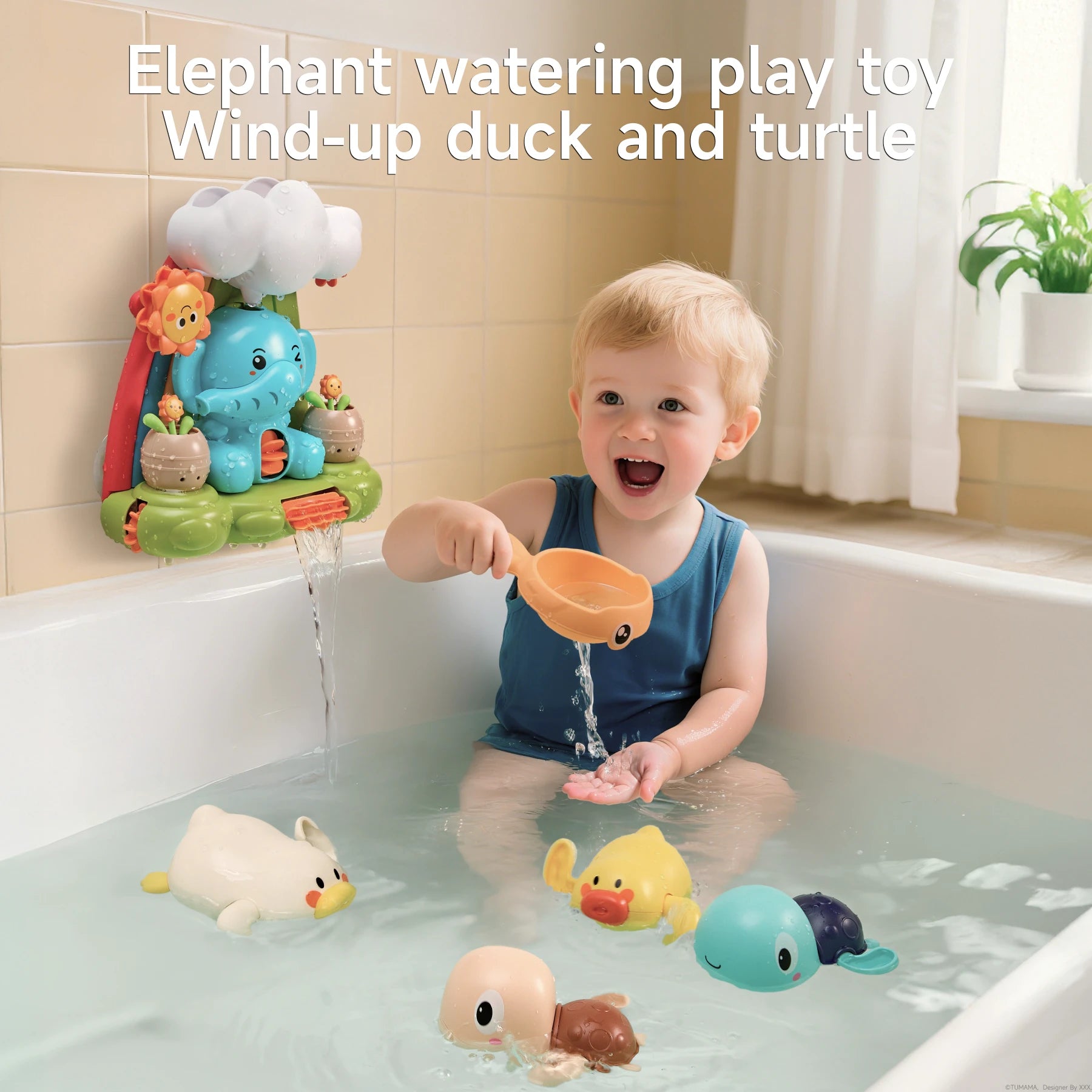Happy toddler playing in a bathtub with an interactive elephant waterfall bath toy mounted on the wall, pouring water with a bunny-ear scoop, surrounded by wind-up floating animal toys including a duck, turtle, and octopus.
