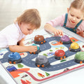 Toddler's stack balance toy featuring trucks and activity mat