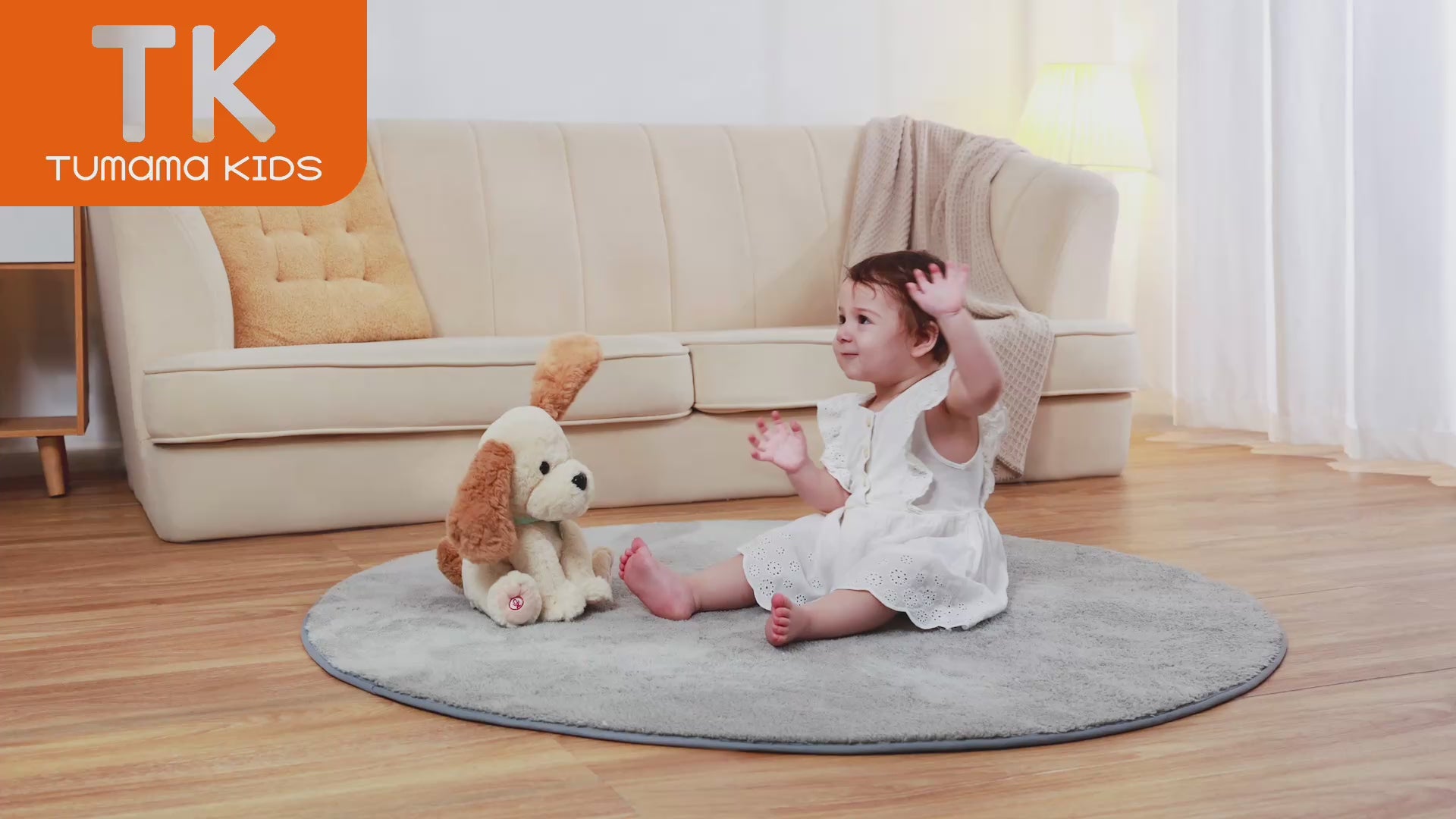 Video of a baby playing with a stuffed dog