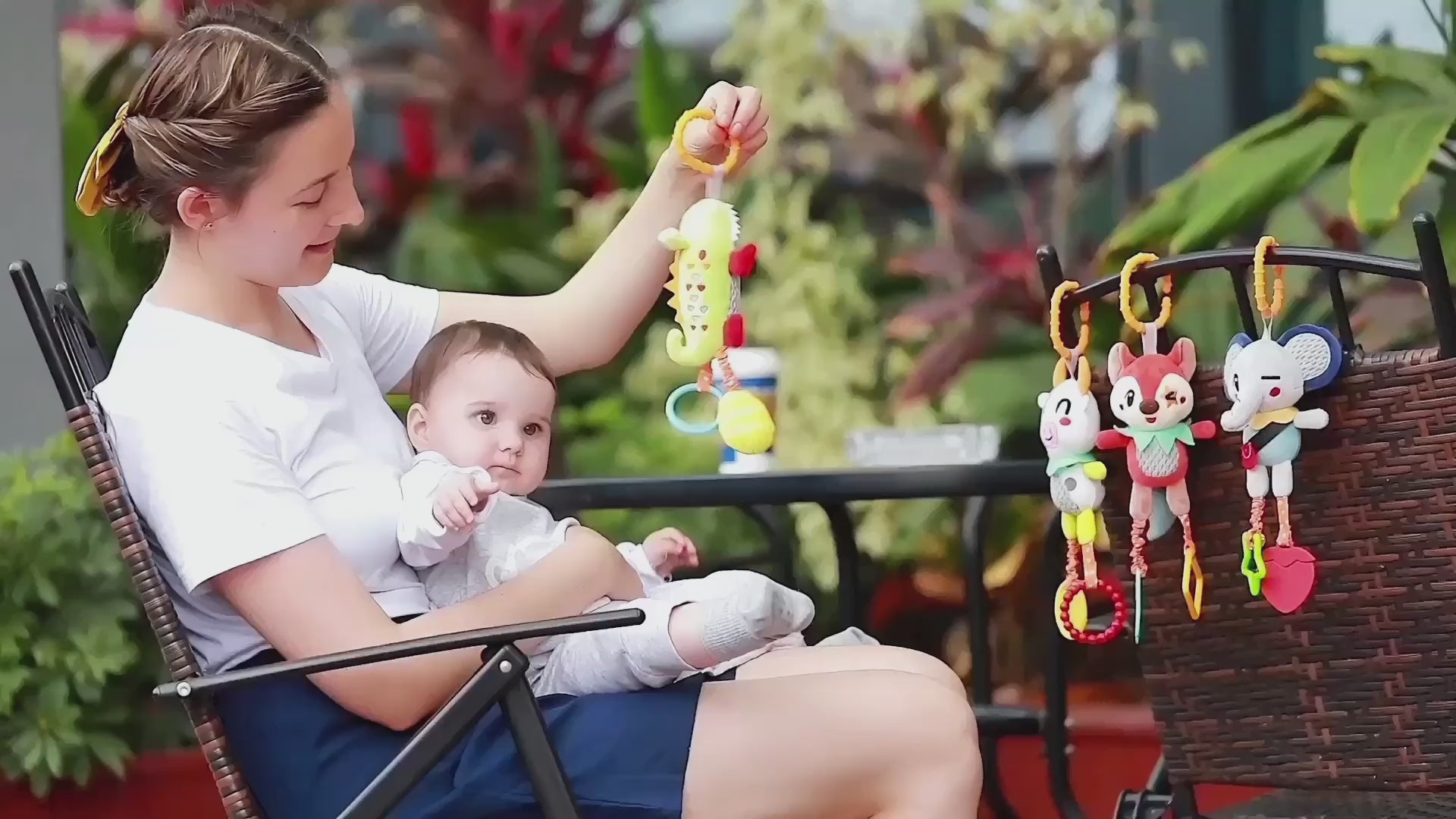 The-baby-is-immersed-in-playing-with-hanging-crib-rattle-toys